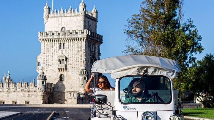 Belém by Private Electric Tuk-Tuk, with the Bordalo II Raccoon