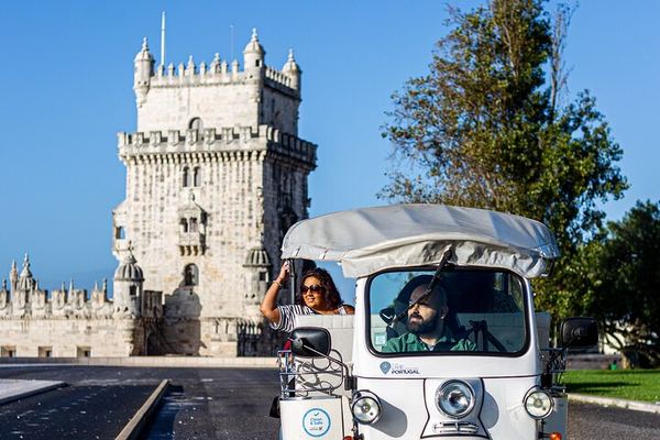 Belém by Private Electric Tuk-Tuk, with the Bordalo II Raccoon