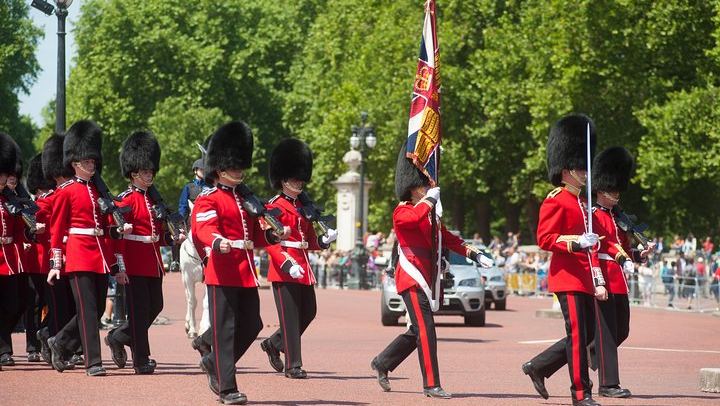 Changing of the Guard with a Headset, in a Group of 15