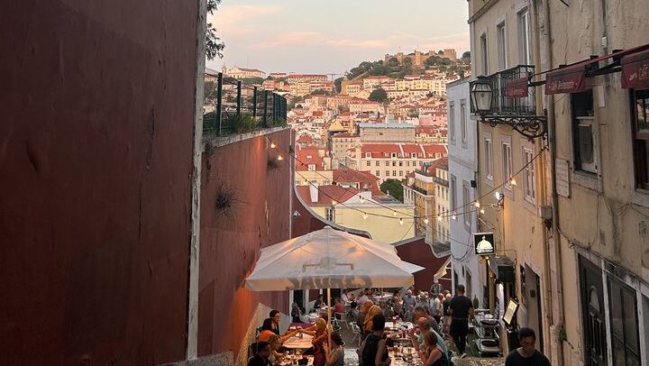Rossio to the Castle First, Then Down Through Alfama, with a Coffee Stop