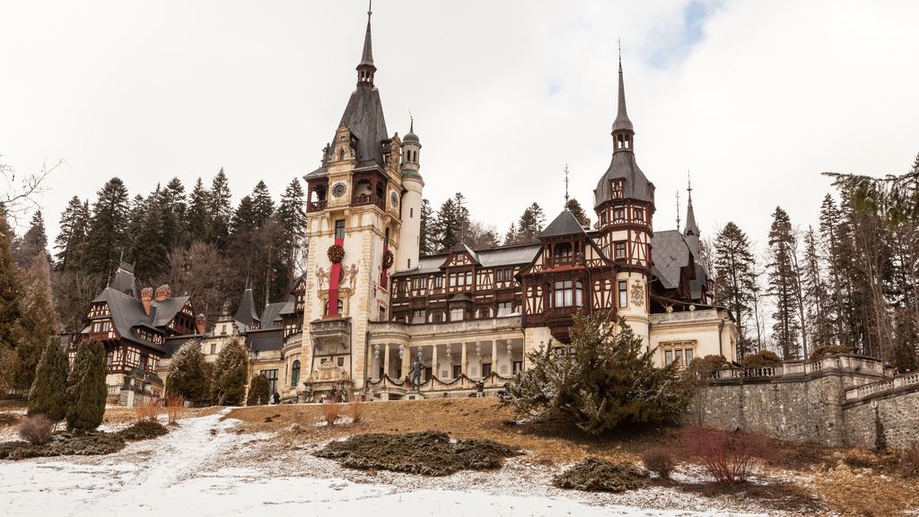 The timbered gables, stone balconies and slender spires of Peles Castle in the Carpathian resort of Sinaia.
