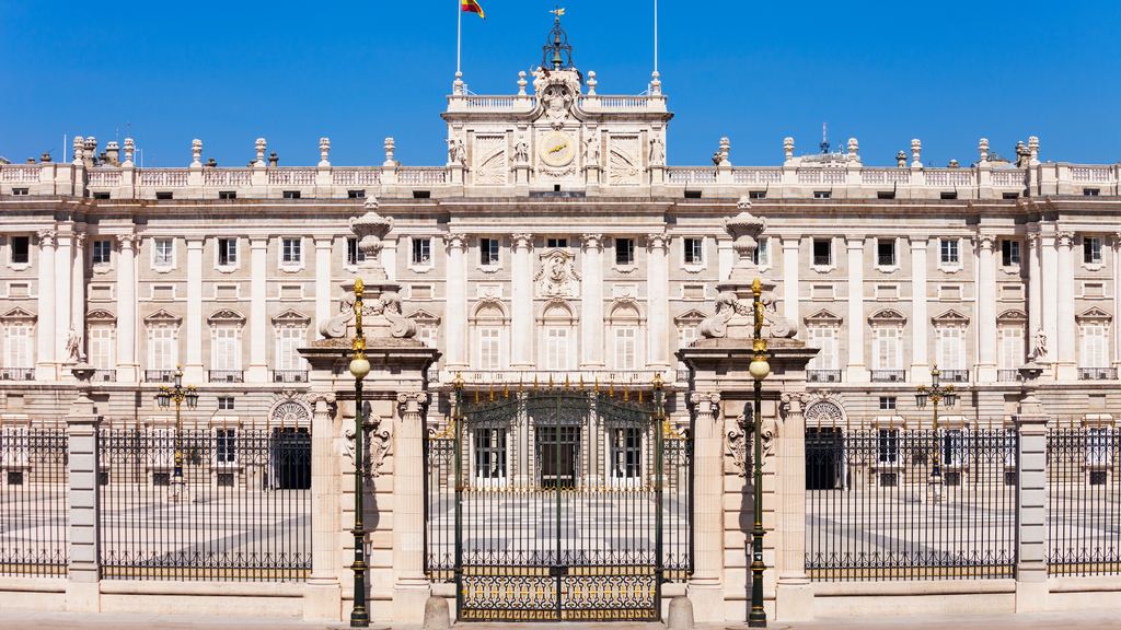 The main front of the Royal Palace of Madrid seen across the Plaza de la Armeria.